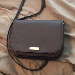 Purple crossbody Kate spade bag
